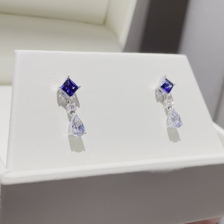 White gold finish hot blue sapphire and created diamond round cut droplet earrings