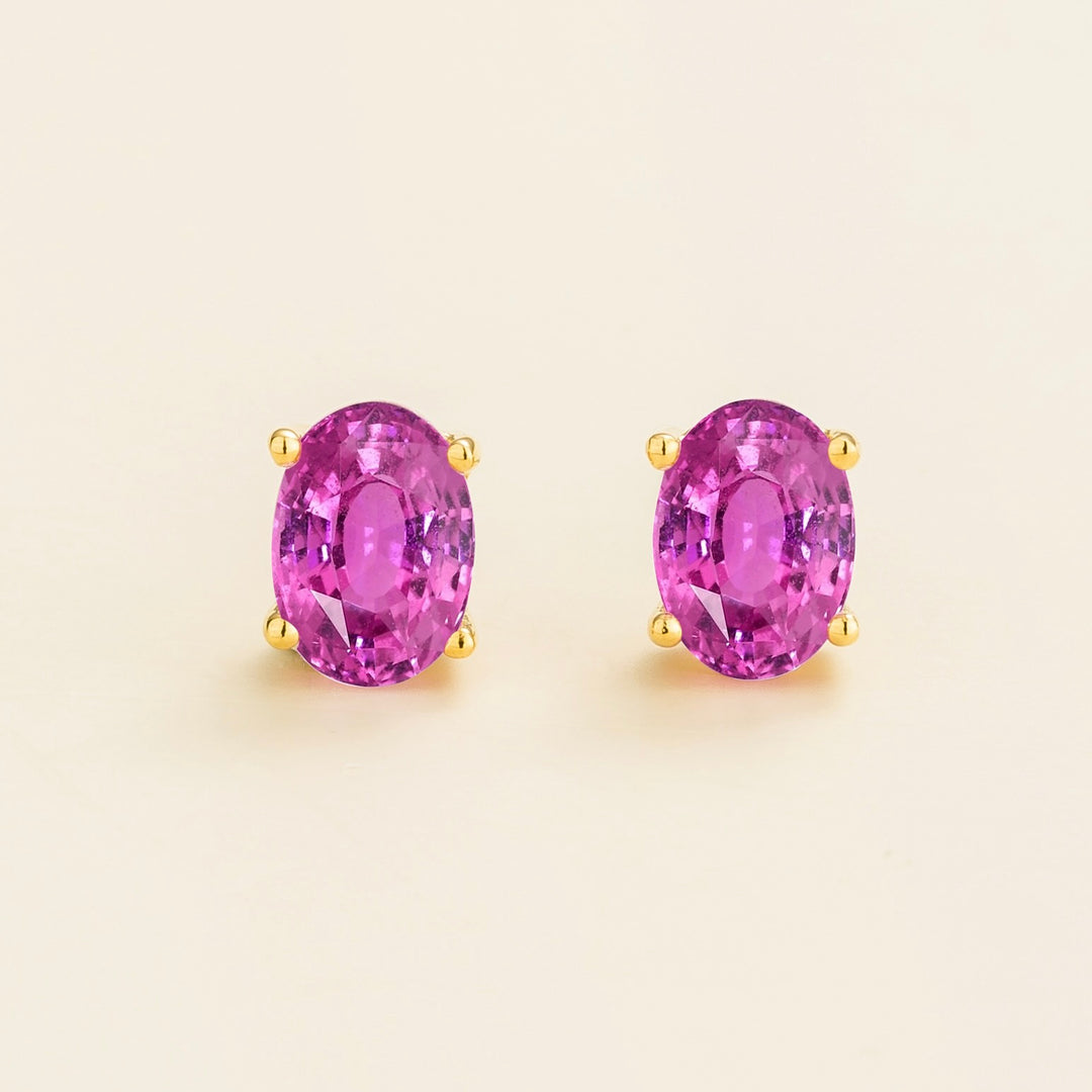 Ovo gold earrings set with vivid Pink sapphire