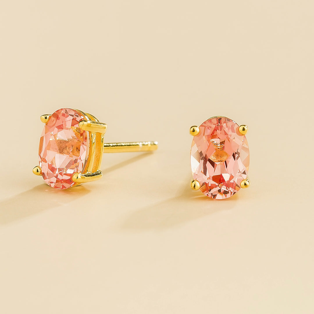 Ovo gold earrings set with Padparadscha sapphire