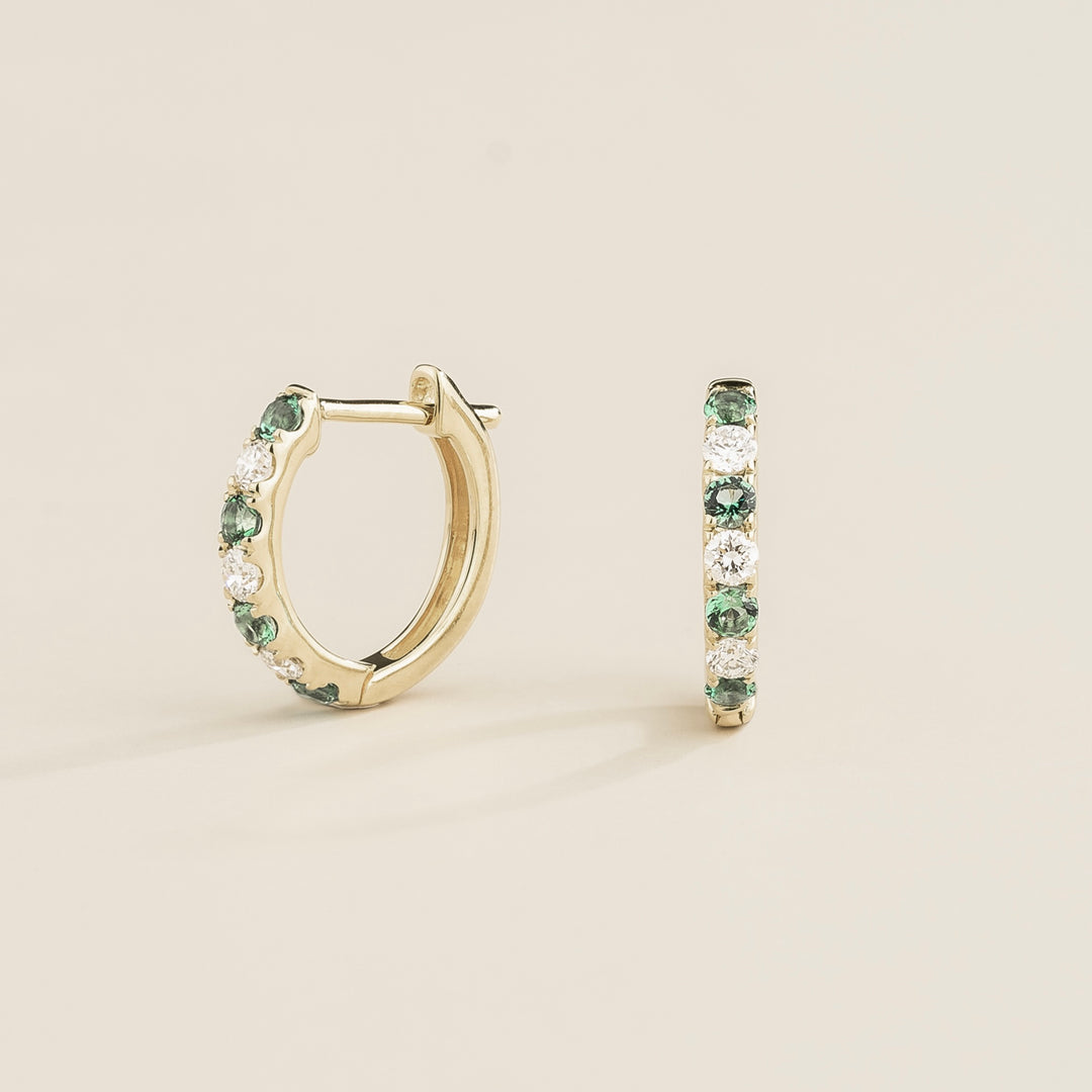 Ciclo White Gold Huggie Earrings set with Emerald & Diamond