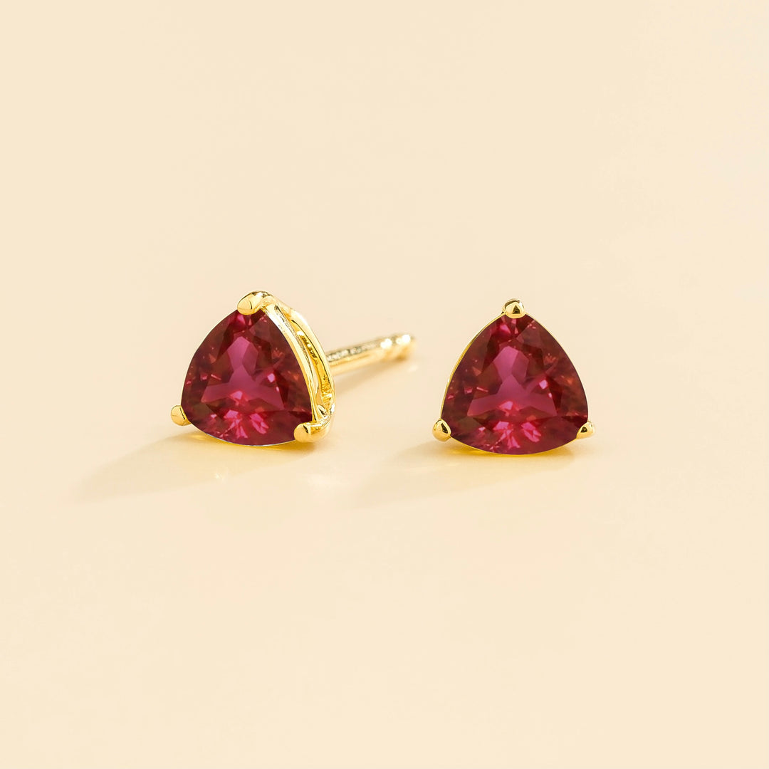 Trillion gold earrings set with Ruby