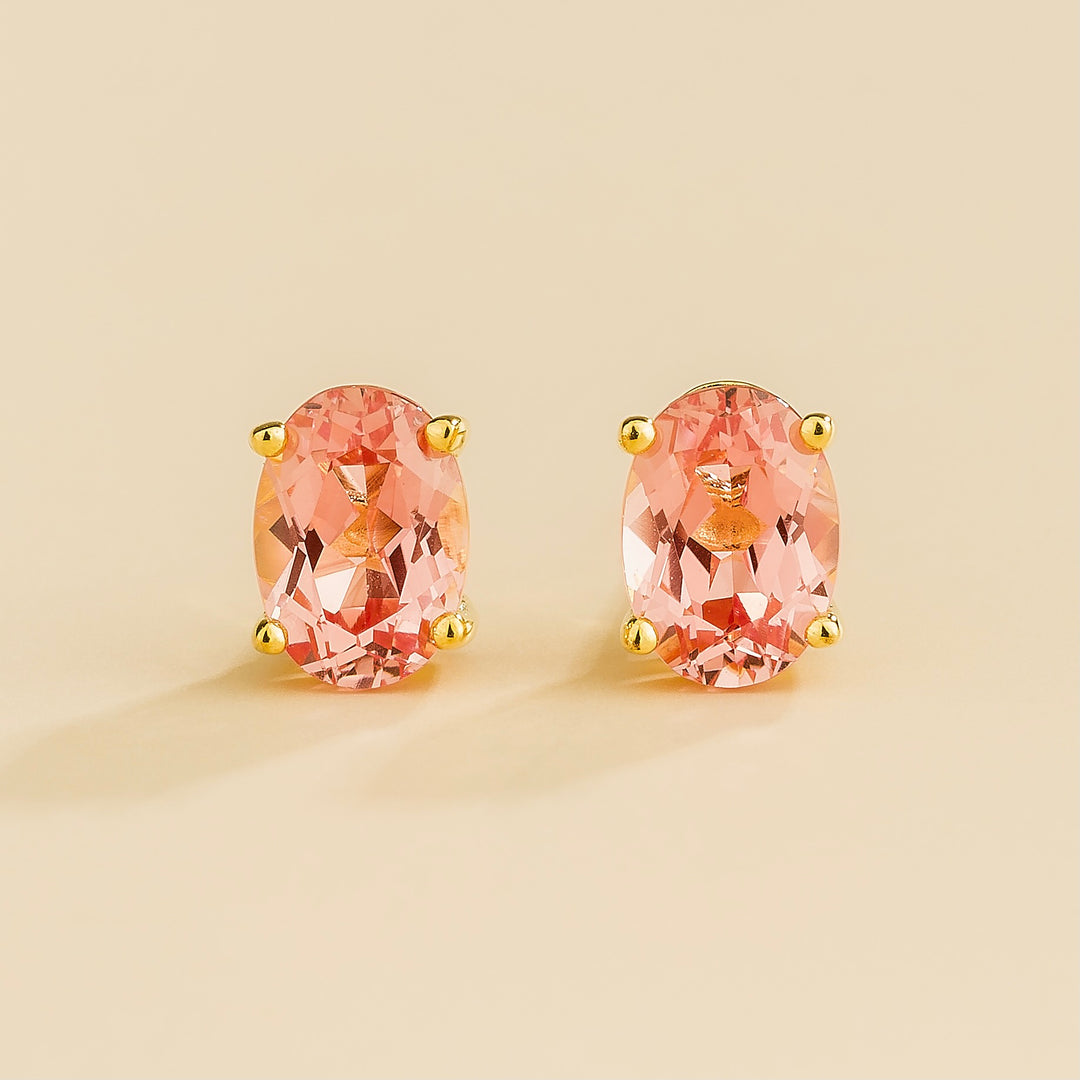 Ovo gold earrings set with Padparadscha sapphire