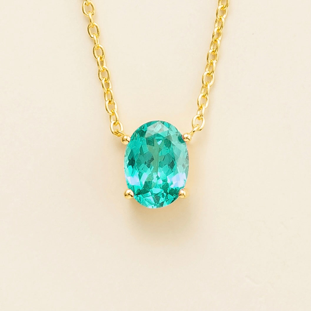 Ovo gold necklace set with Paraiba sapphire