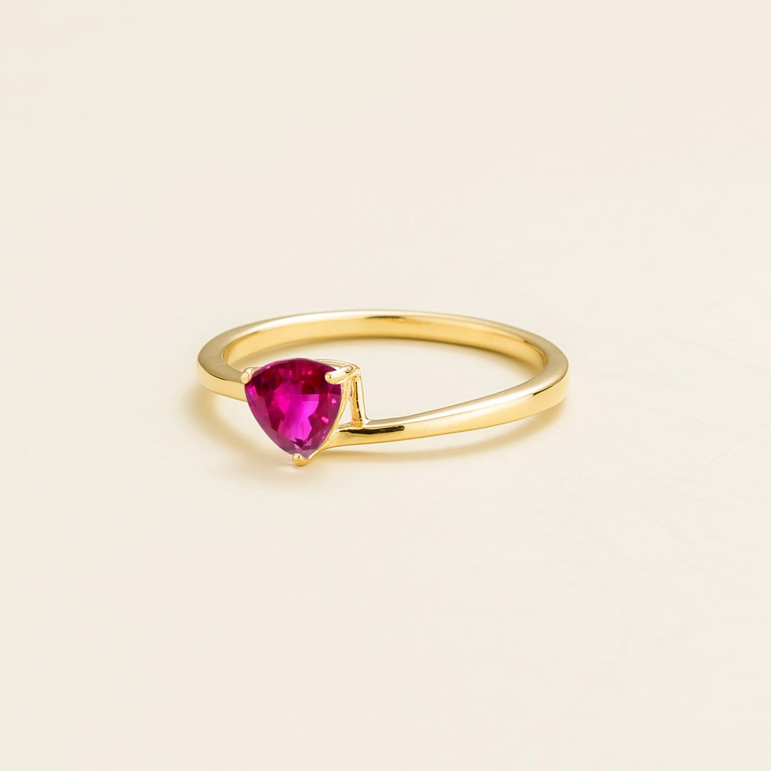 Trillion gold ring set with vivid Pink sapphire