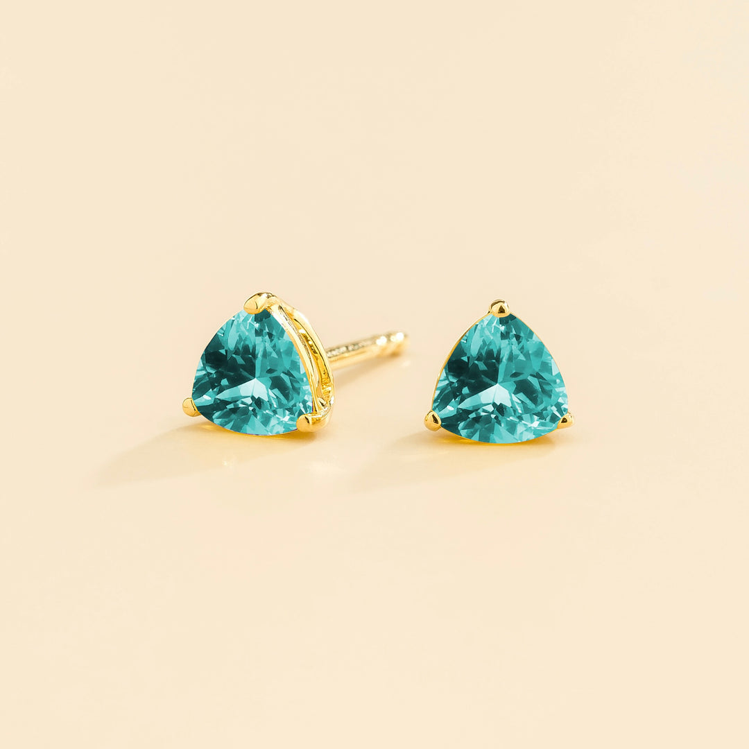 Trillion gold earrings set with Paraiba sapphire