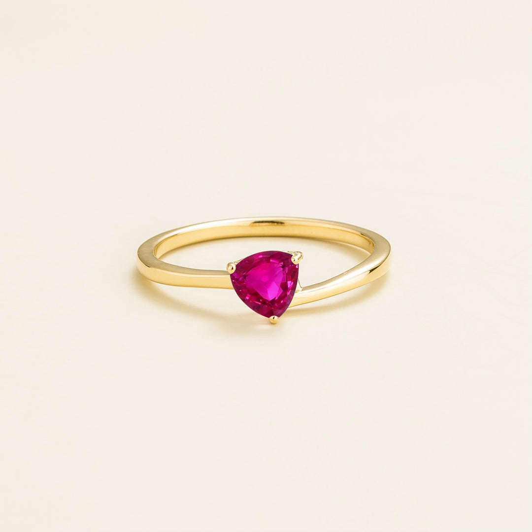 Trillion gold ring set with vivid Pink sapphire