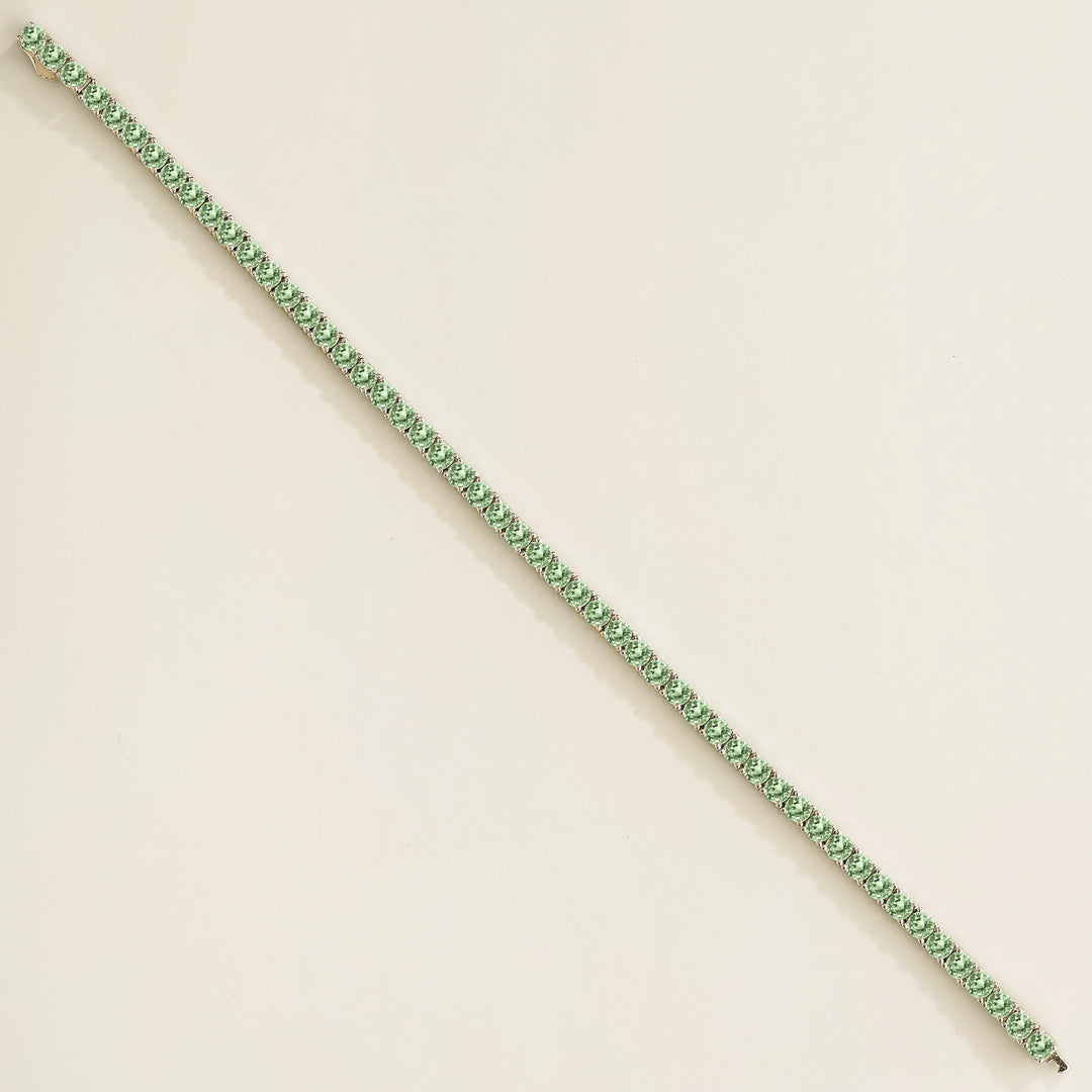 Ciclo white gold tennis bracelet set with Green sapphire