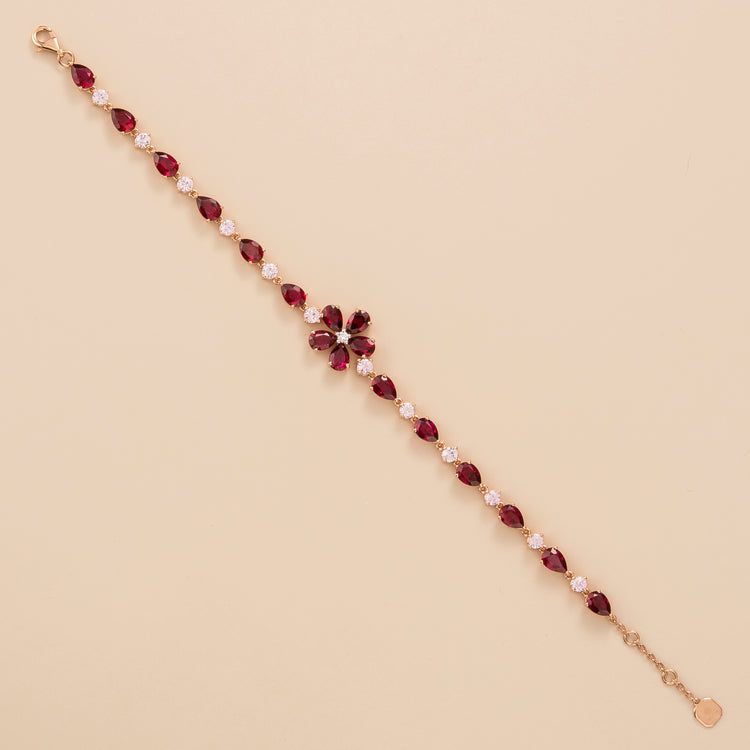 Florea flower floral bracelet in 18K pink gold vermeil set with lab grown diamond, ruby and pink sapphire gem stones.