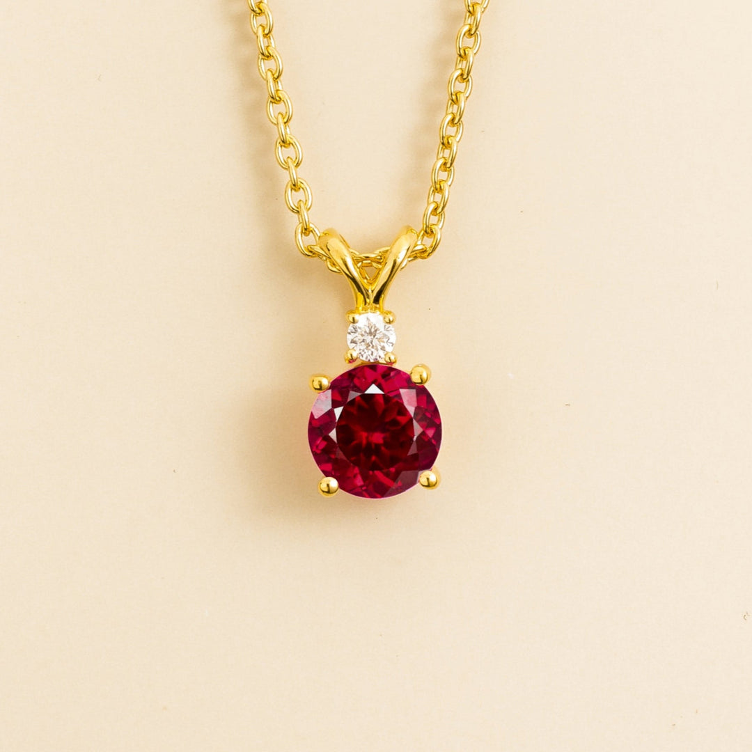 gold necklace set in ruby and diamond