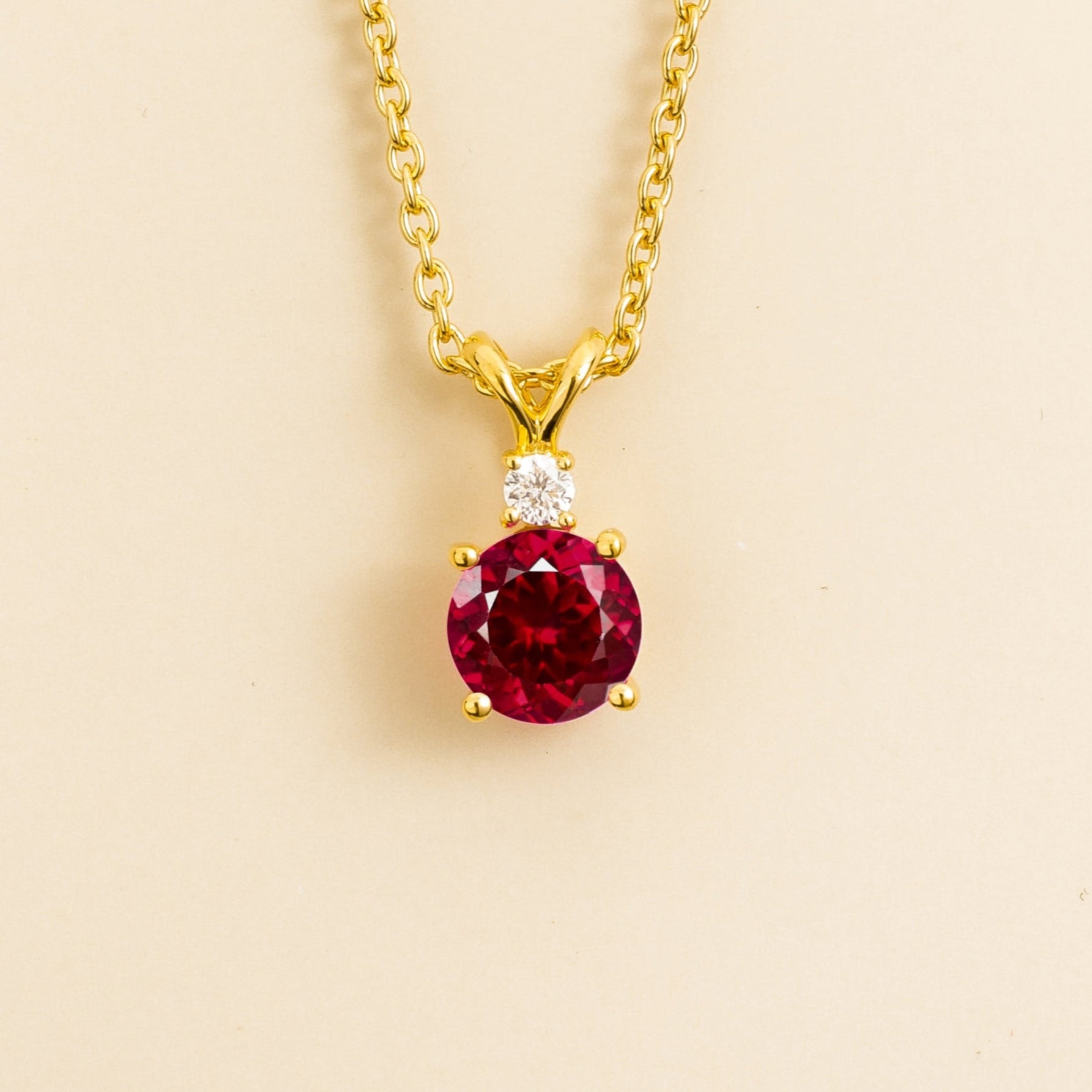 gold necklace set in ruby and diamond