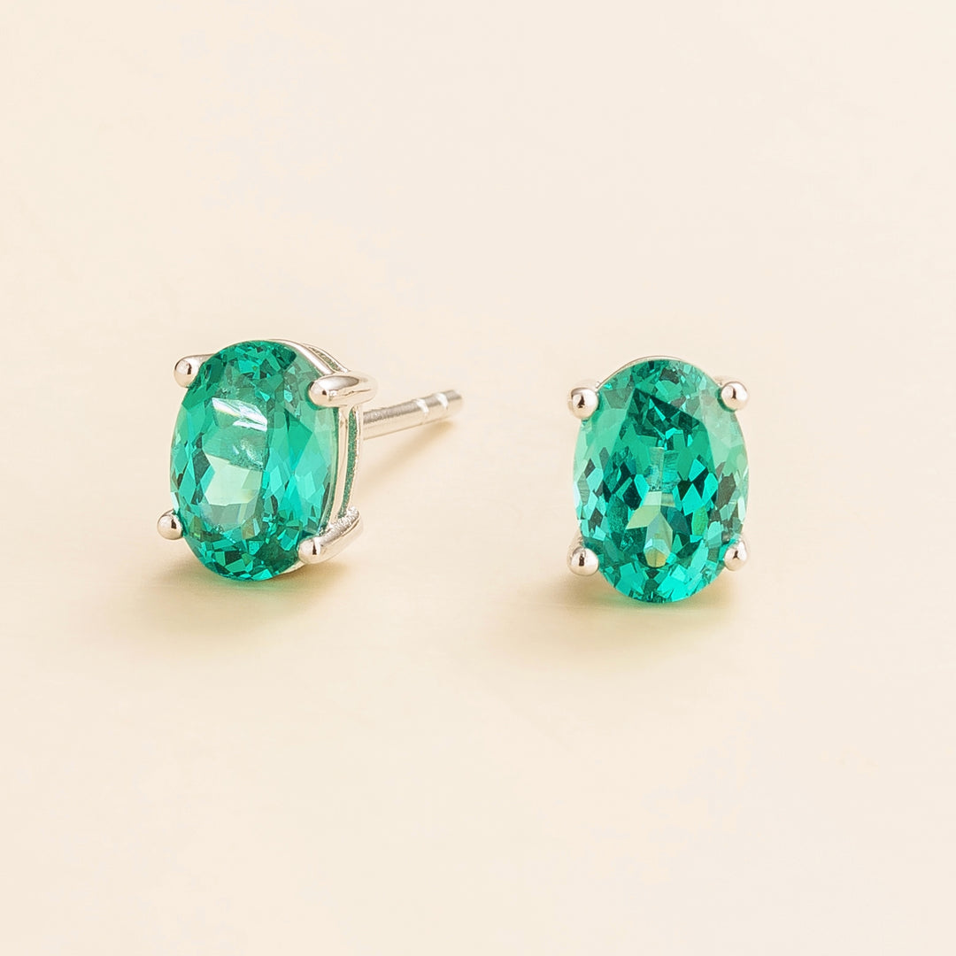 Ovo white gold earrings set with Paraiba sapphire