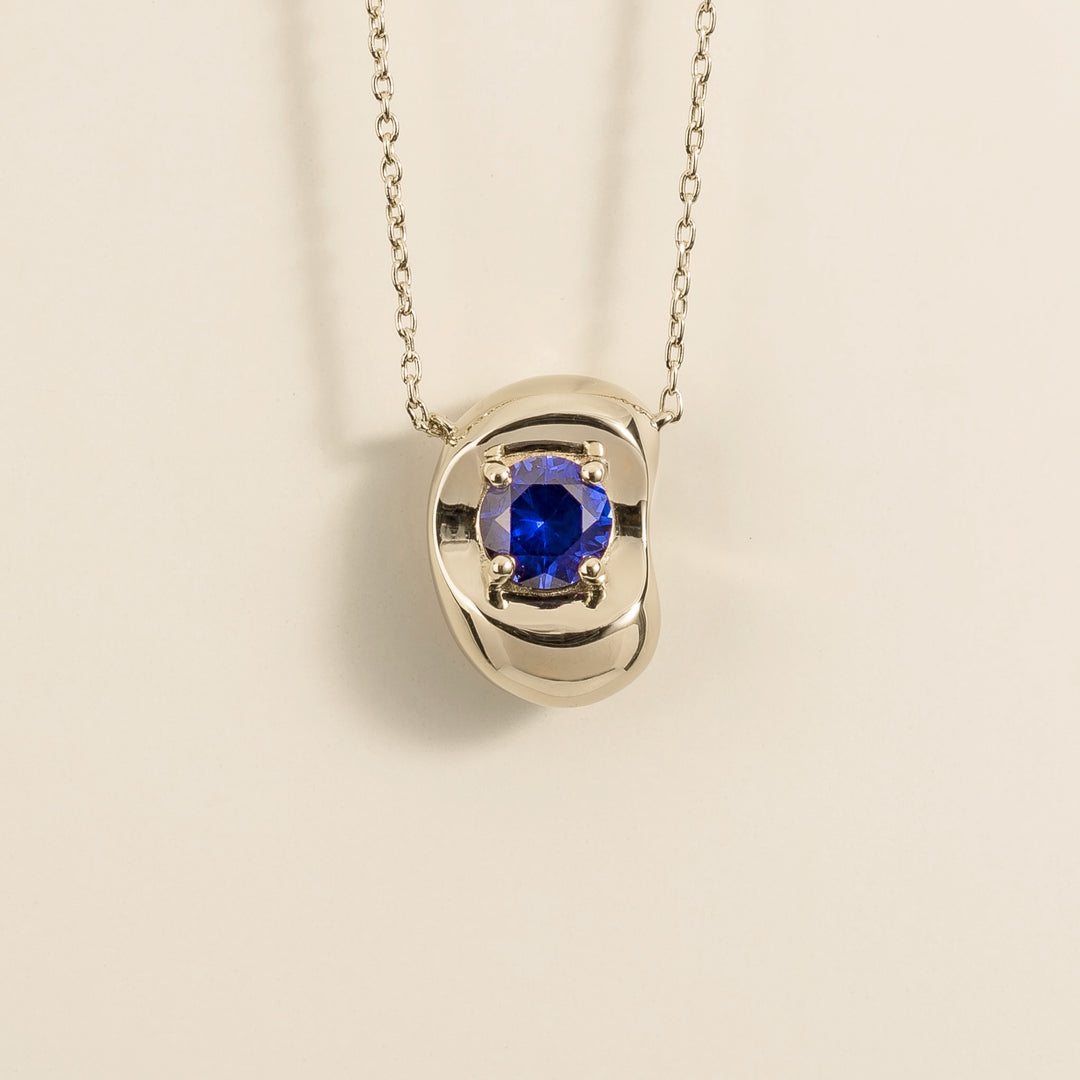Fava White Gold Necklace Set With Blue Sapphire