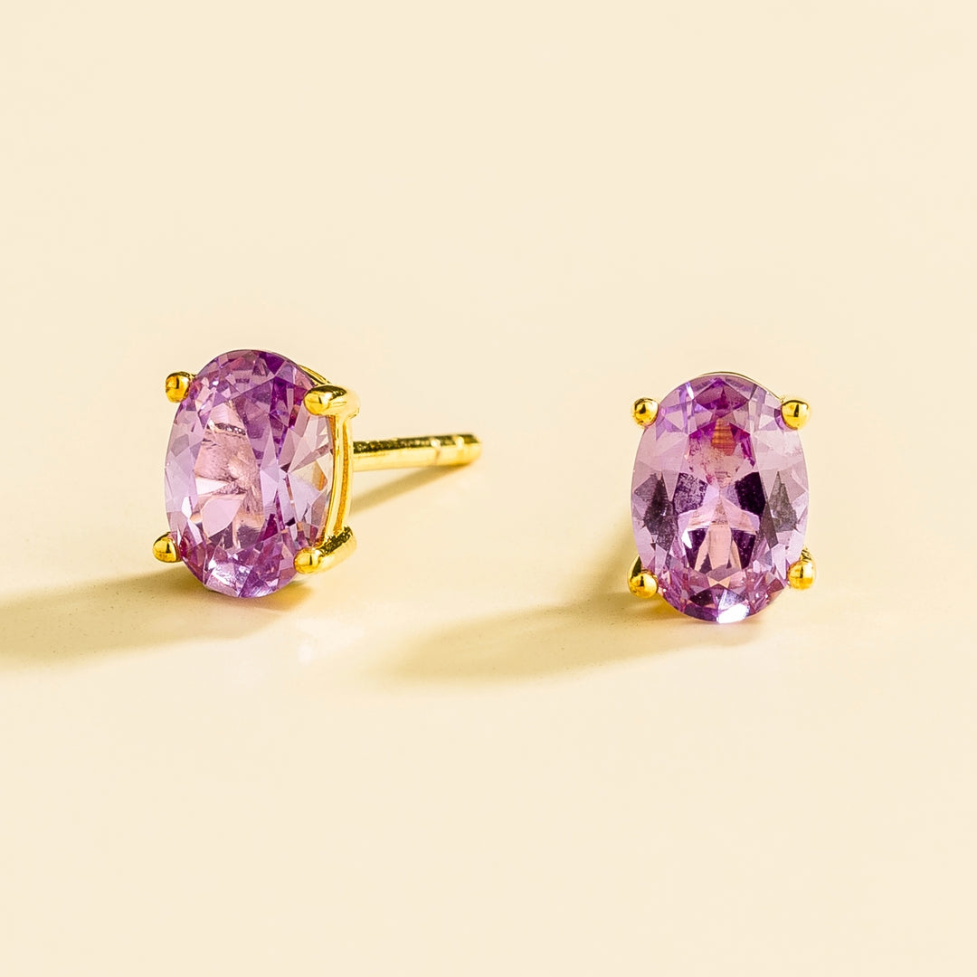 Ovo gold earrings set with Purple sapphire