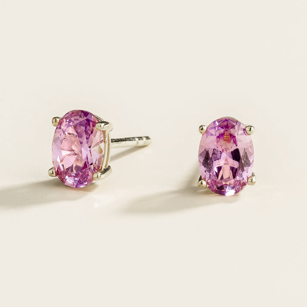 Ovo white gold earrings set with Purple sapphire