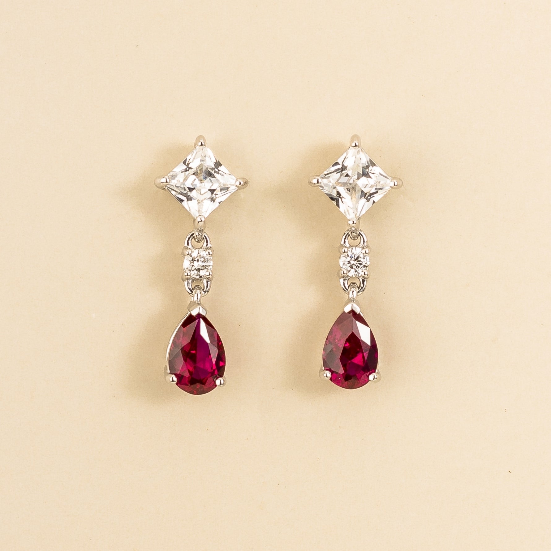 Ori white gold earrings set with Diamond & Ruby