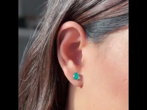 Ovo white gold earrings set with Paraiba sapphire